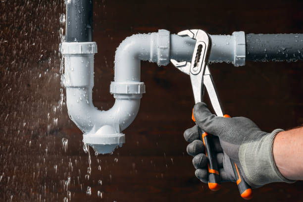 Professional Drain Cleaning technician working in Le Claire, IA